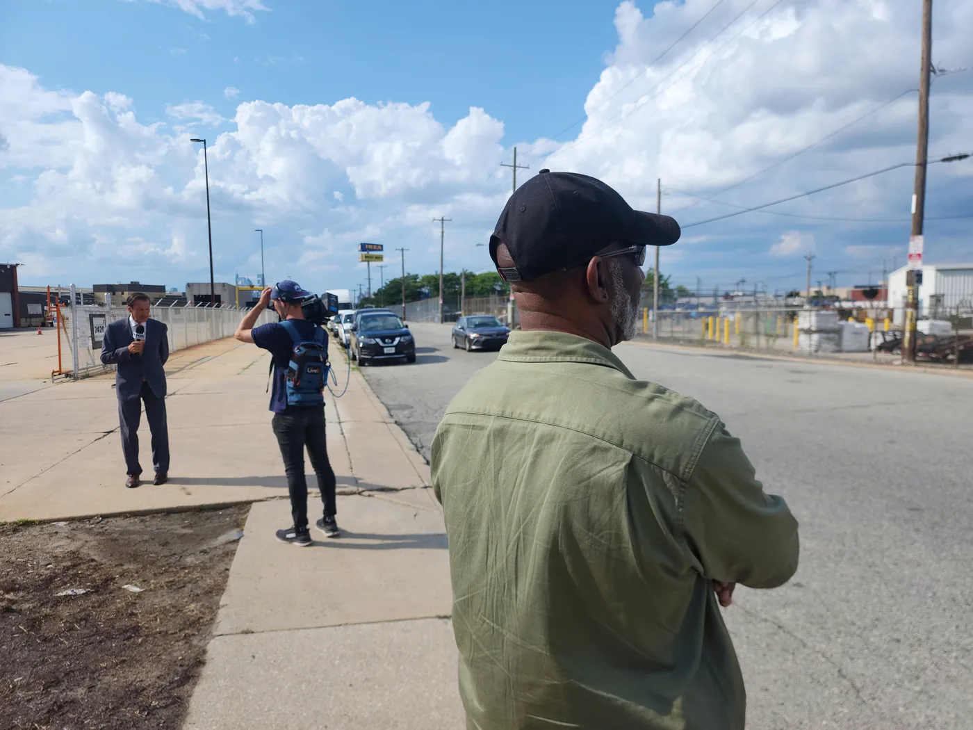 OTAC security professional observing field operations.