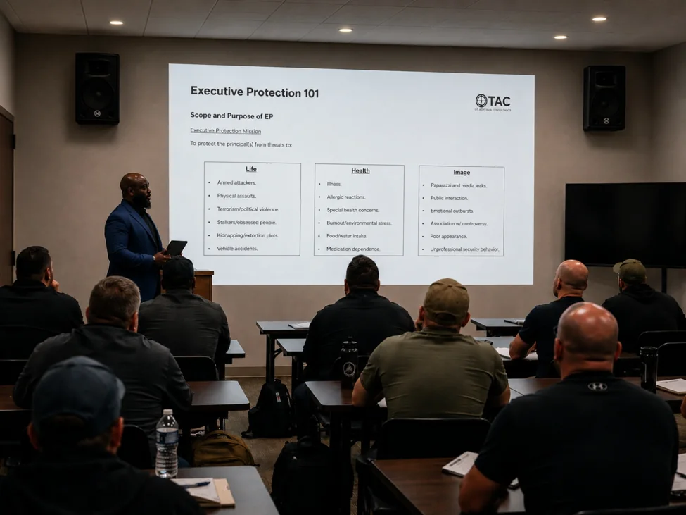 An instructor teaching executive protection principles in a professional classroom.